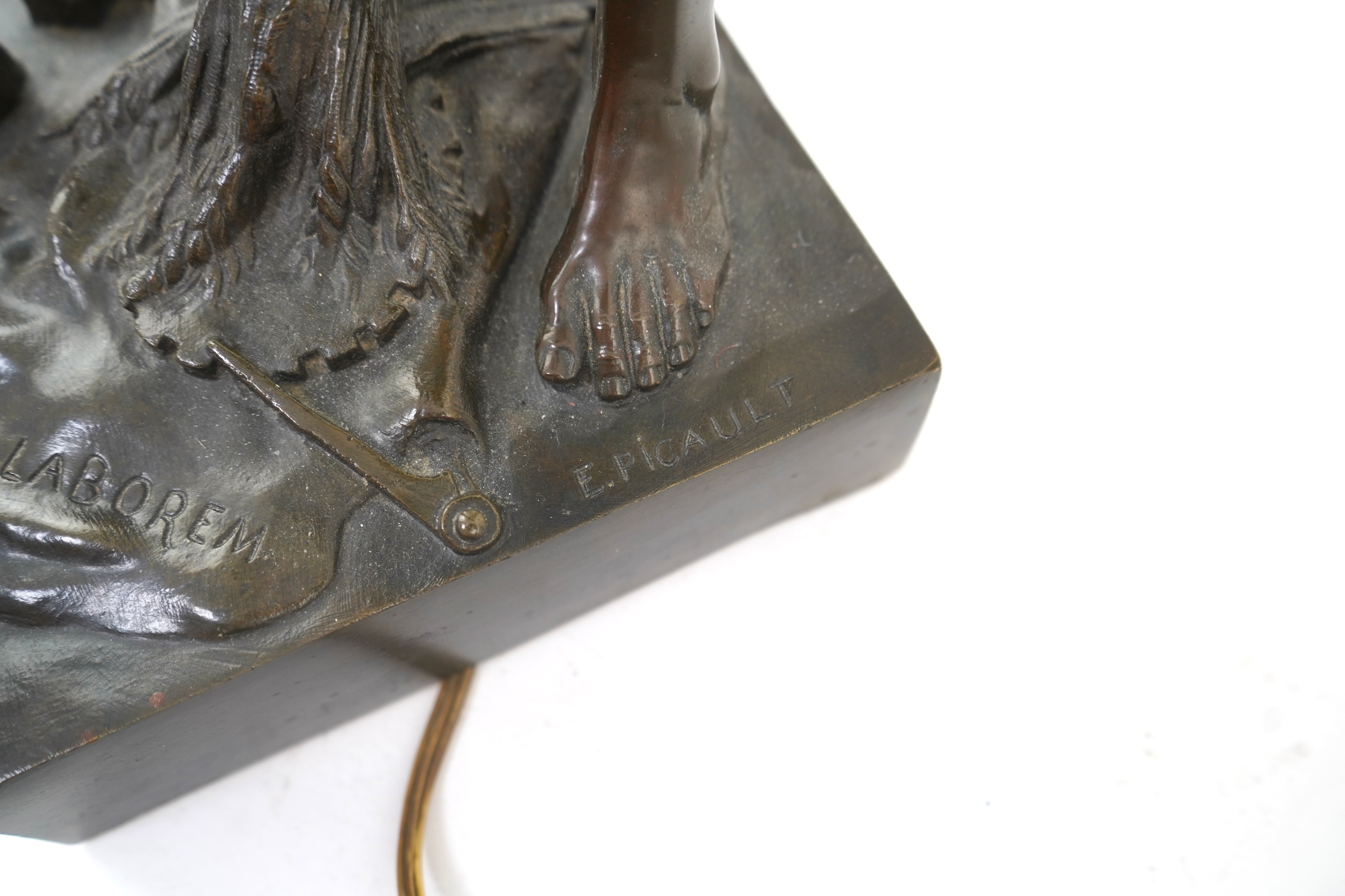 After Émile Louis Picault, a large bronze figural lamp